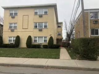 a view of house with yard