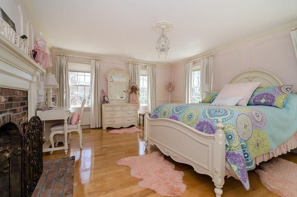56 Sears Road Southborough, MA 01772 - Photo 12 of 26 a bedroom with a bed and wooden floor