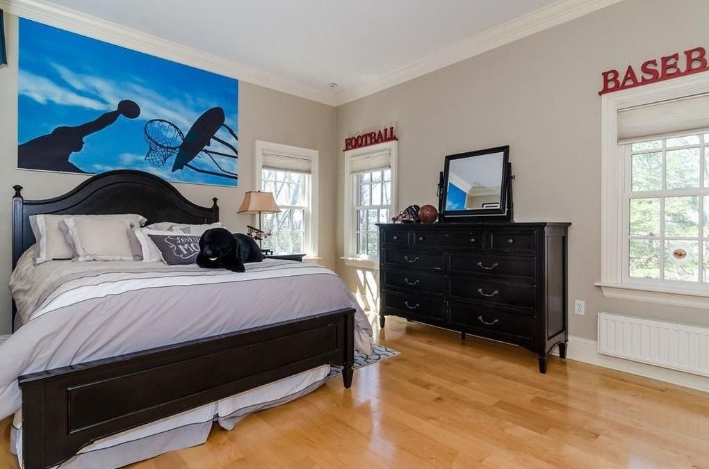 56 Sears Road Southborough, MA 01772 - Photo 13 of 26 a bedroom with a bed and a dresser