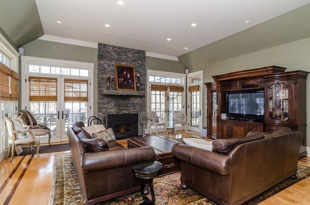 56 Sears Road Southborough, MA 01772 - Photo 6 of 26 a living room with furniture and a fireplace
