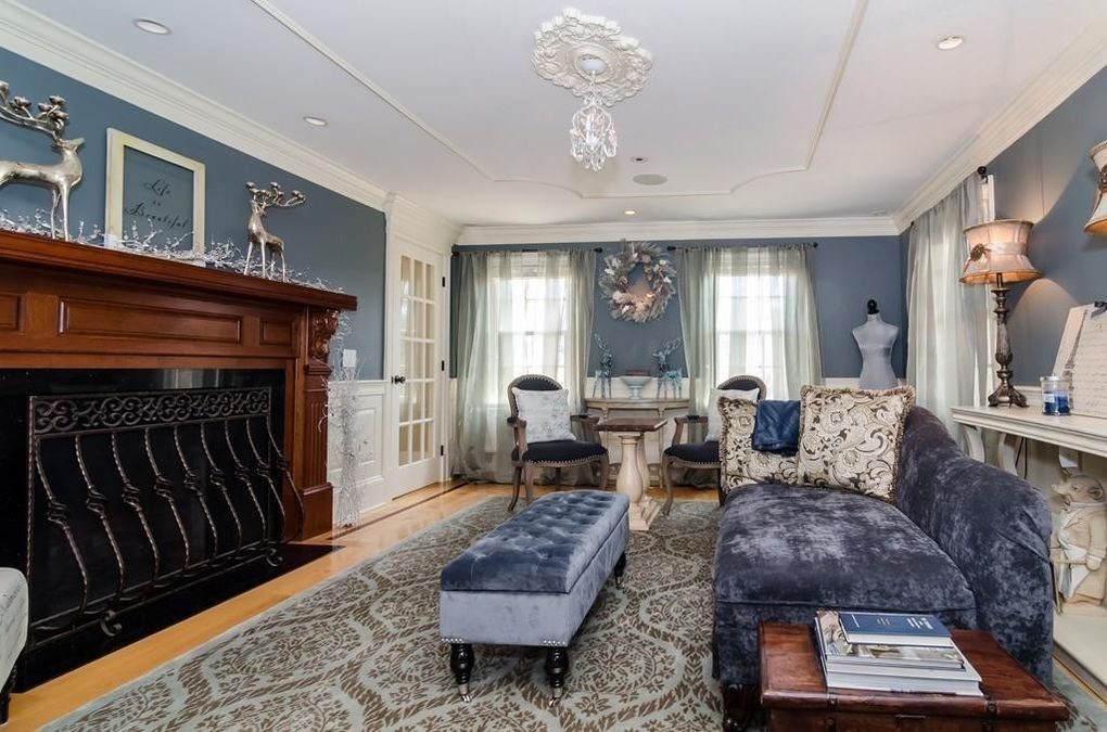 56 Sears Road Southborough, MA 01772 - Photo 9 of 26 a living room with furniture and a fireplace