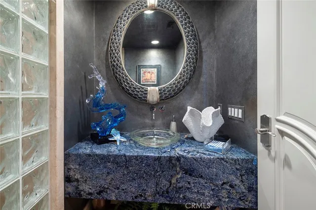 a kitchen with stainless steel appliances granite countertop a refrigerator sink and cabinets