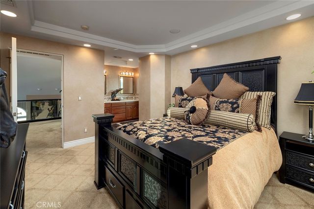 a bathroom with a bathtub and a window