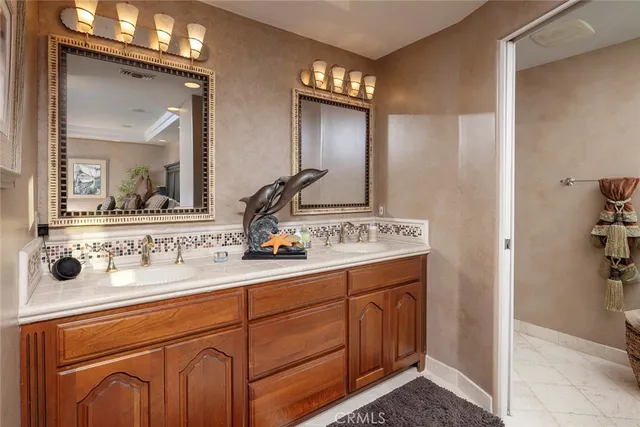 a view of a balcony next to a house with outdoor seating