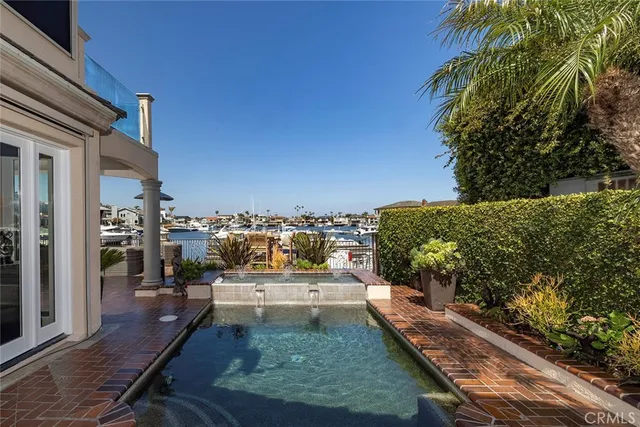 a view of a dinning table and chairs in patio
