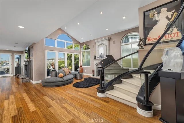 a view of a living room and entryway