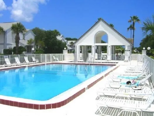 a view of a house with swimming pool