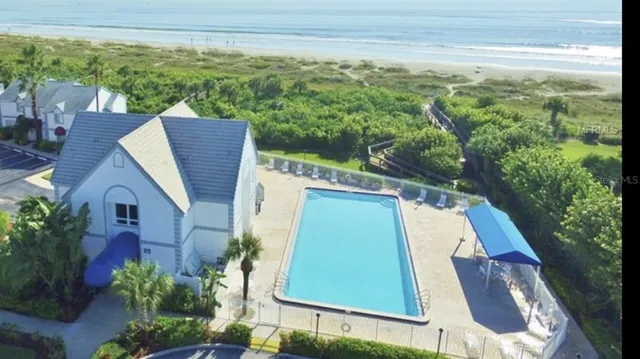 a view of a yard from a balcony