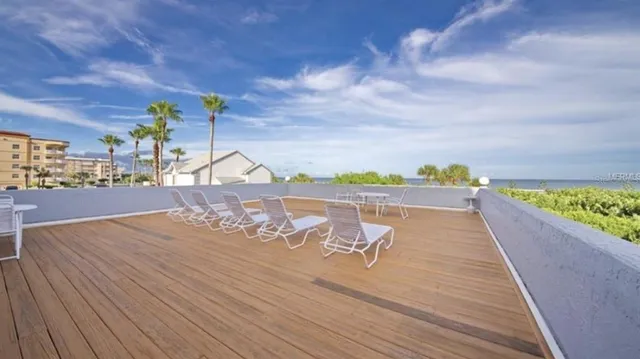 a view of balcony and yard