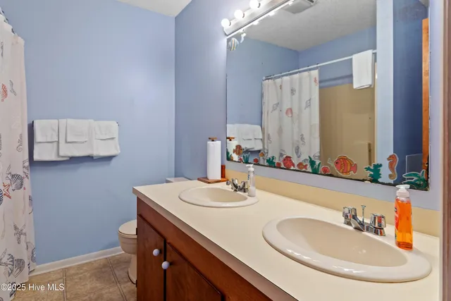 $1,225,000 | 1097 Ocean Boulevard West, Holden Beach, NC 28462