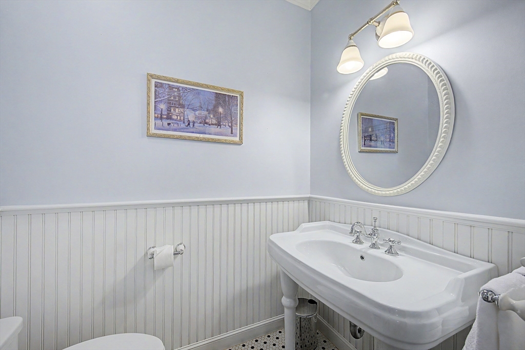 270 Mendon Road Sutton, MA 01590 - Photo 24 of 42 a bathroom with a toilet a sink and mirror