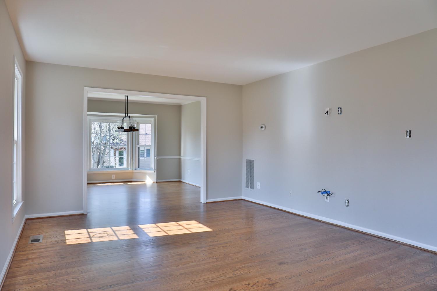 5423 Rilian Court Burke, VA 22015 - Photo 15 of 67 a view of an empty room with wooden floor