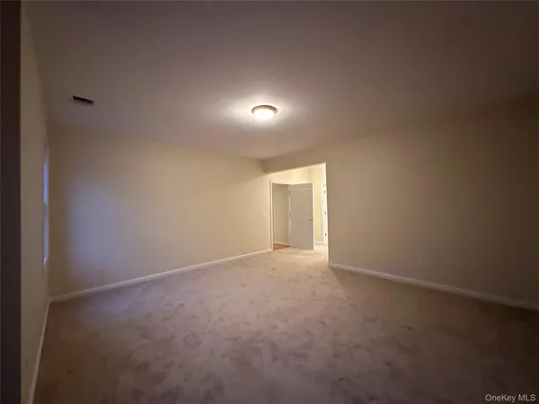 a bathroom with a shower a toilet and a shower