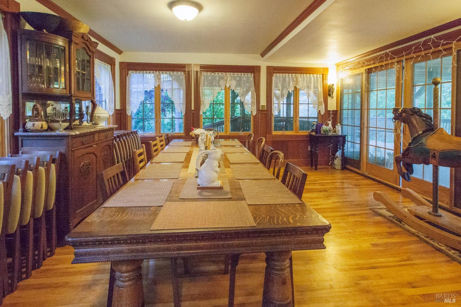 200 Rd To Ranch Nicasio, CA 94946 - Photo 6 of 37 a dining room with furniture and wooden floor