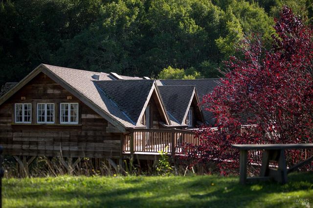 a view of a lake with a yard