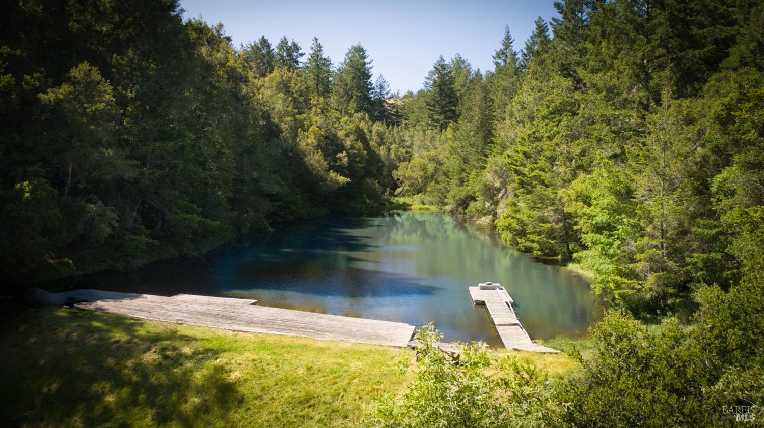 200 Rd To Ranch Nicasio, CA 94946 - Photo 9 of 37 a view of a lake with a yard