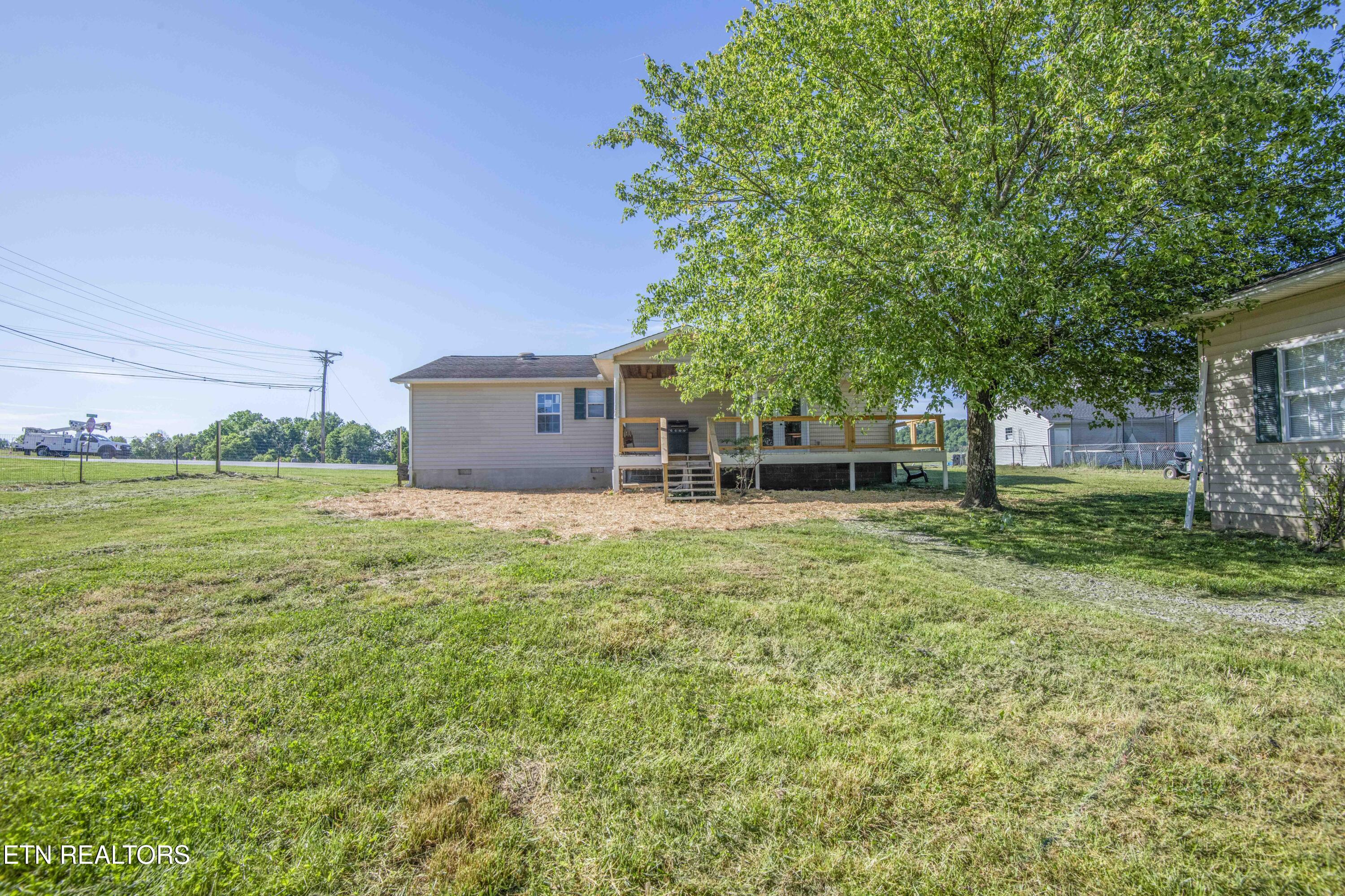 1104 Swan Pond Cir Road Harriman, TN 37748 - Photo 33 of 40 yard and back