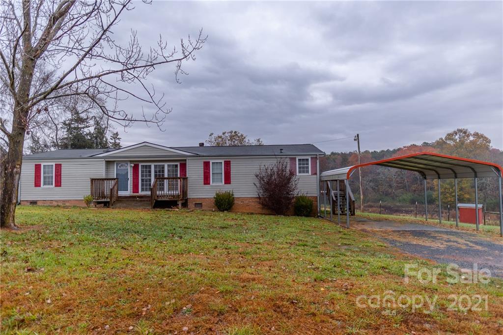 5432 Rushing Road Stanfield, NC 28163 - Photo 1 of 34 a view of a yard in front of a house