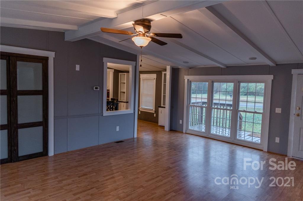 5432 Rushing Road Stanfield, NC 28163 - Photo 14 of 34 a view of an entryway with wooden floor