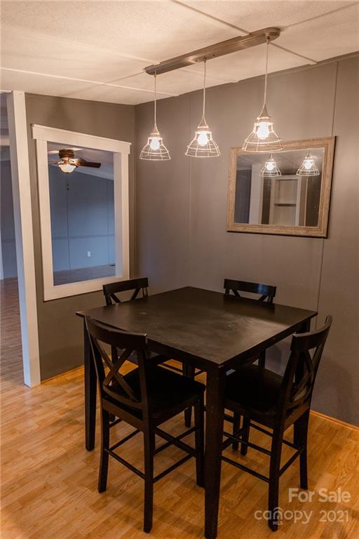 5432 Rushing Road Stanfield, NC 28163 - Photo 18 of 34 a view of a dining room with furniture