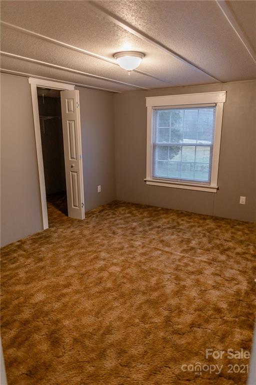 5432 Rushing Road Stanfield, NC 28163 - Photo 20 of 34 a view of an empty room
