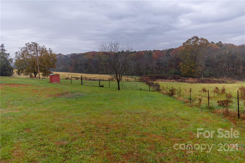 5432 Rushing Road Stanfield, NC 28163 - Photo 3 of 34 a view of an outdoor space and yard