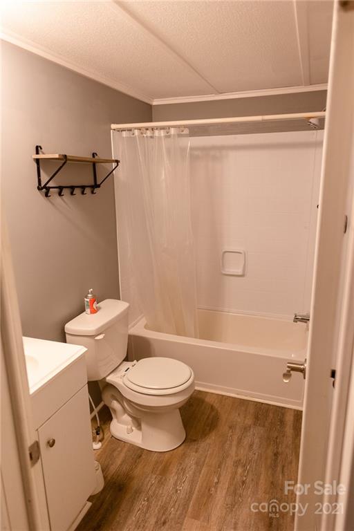 5432 Rushing Road Stanfield, NC 28163 - Photo 26 of 34 a bathroom with a toilet and a shower