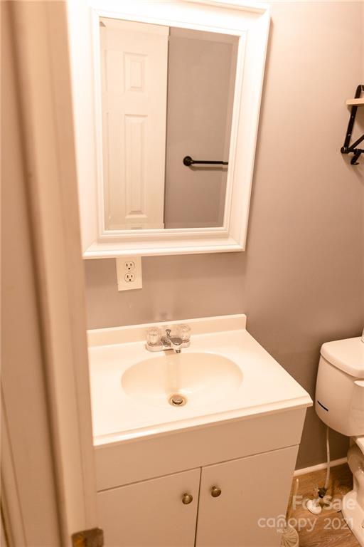 5432 Rushing Road Stanfield, NC 28163 - Photo 27 of 34 a bathroom with a sink and a vanity
