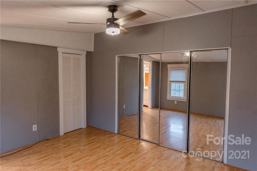 5432 Rushing Road Stanfield, NC 28163 - Photo 9 of 34 wooden floor in an empty room