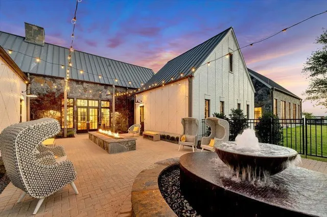 a front view of a house with patio