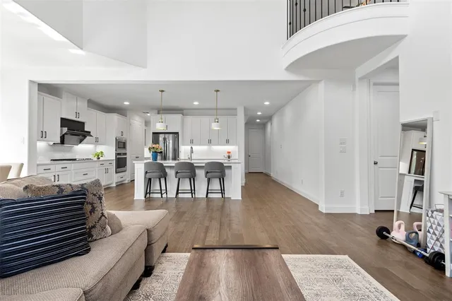 a living room with furniture and a table