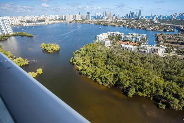 a view of a lake with a city