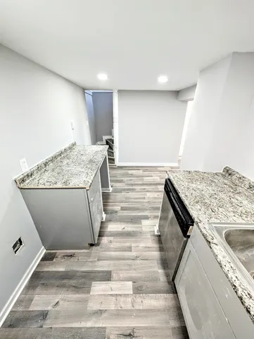 a view of a kitchen cabinets