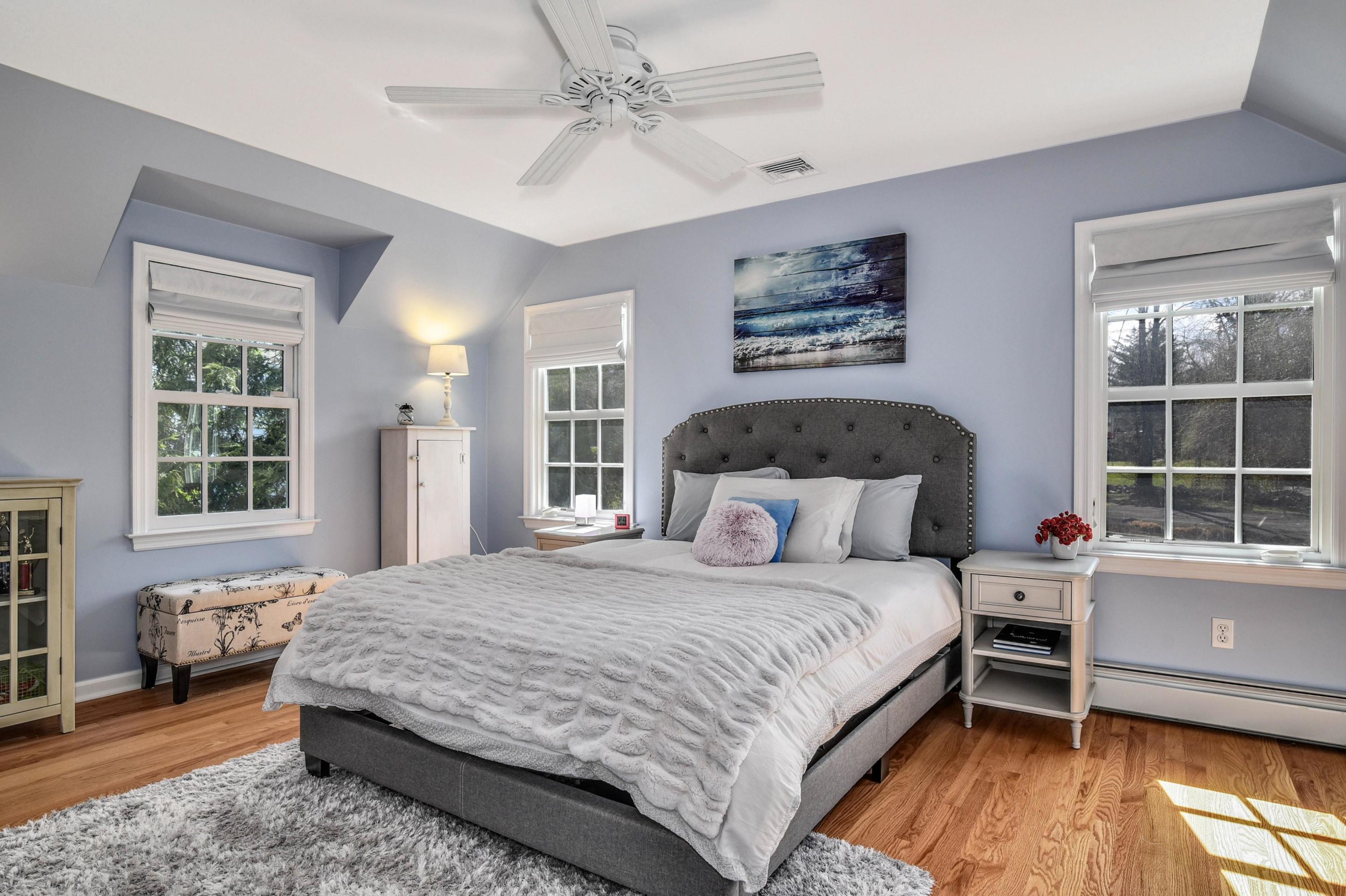 28 Briar Brae Road Darien, CT 06820 - Photo 18 of 33 a bedroom with a large bed and a window
