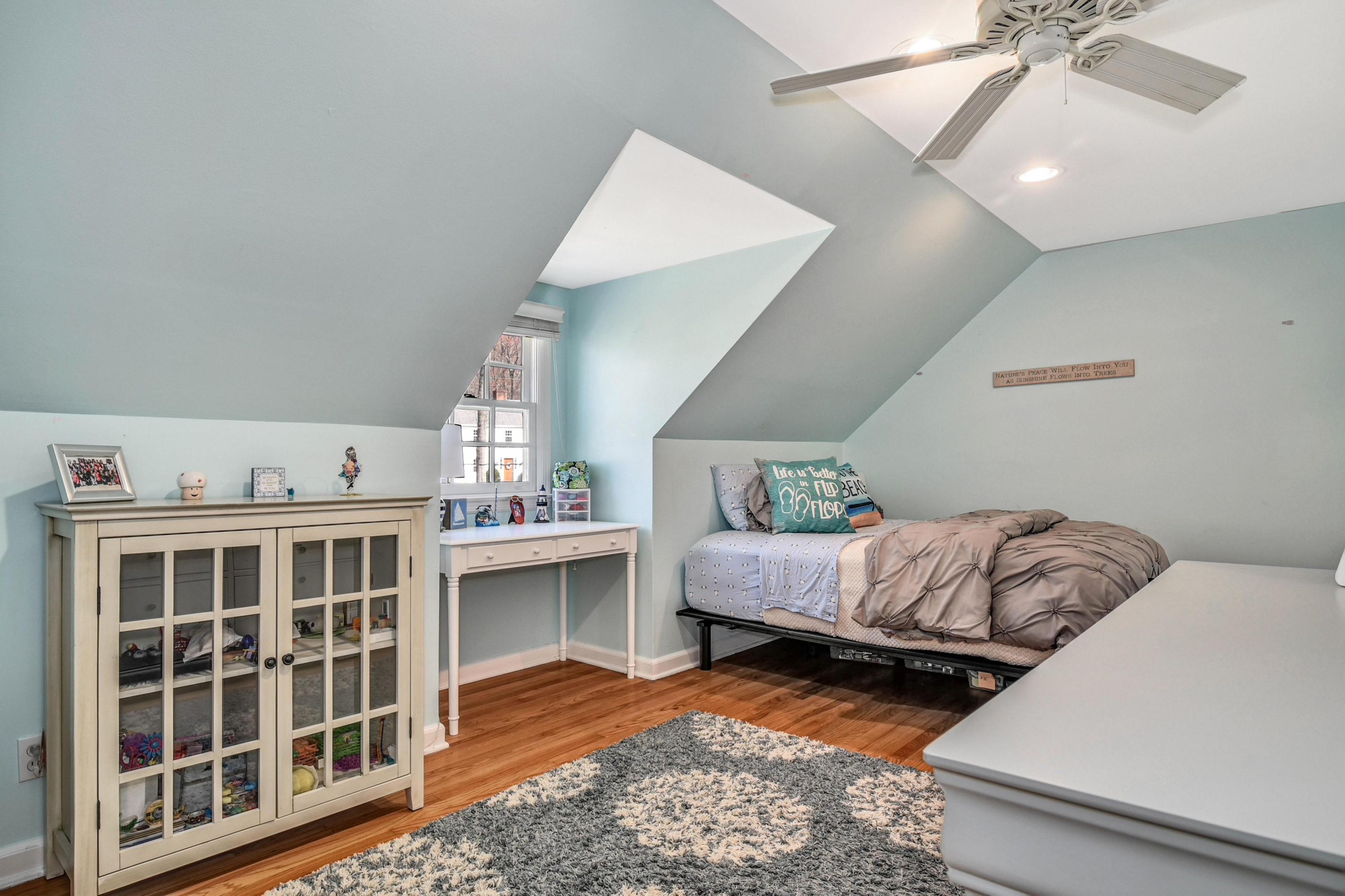 28 Briar Brae Road Darien, CT 06820 - Photo 20 of 33 a bedroom with furniture and a window