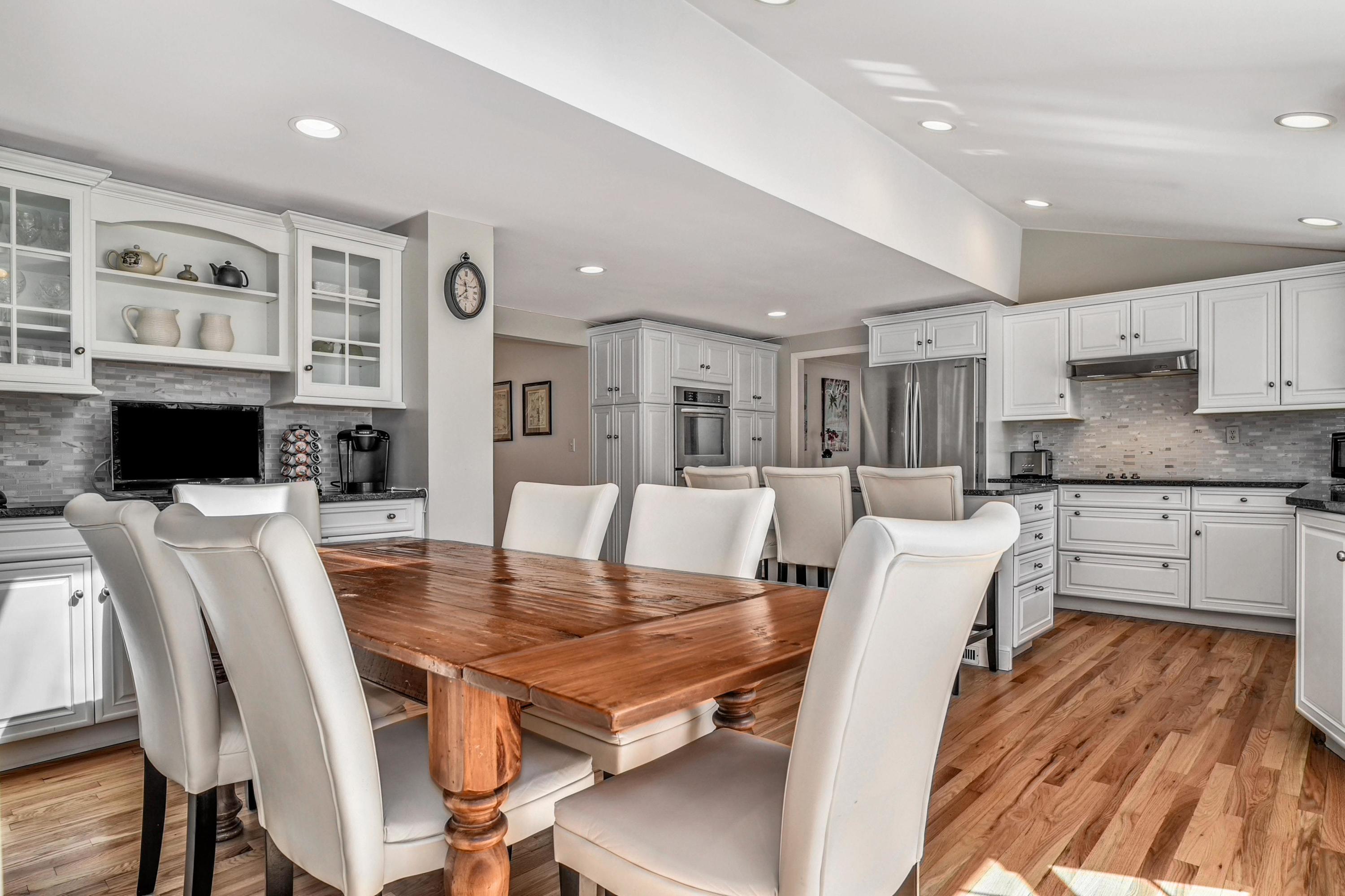28 Briar Brae Road Darien, CT 06820 - Photo 2 of 33 a living room with furniture dining table and a fireplace
