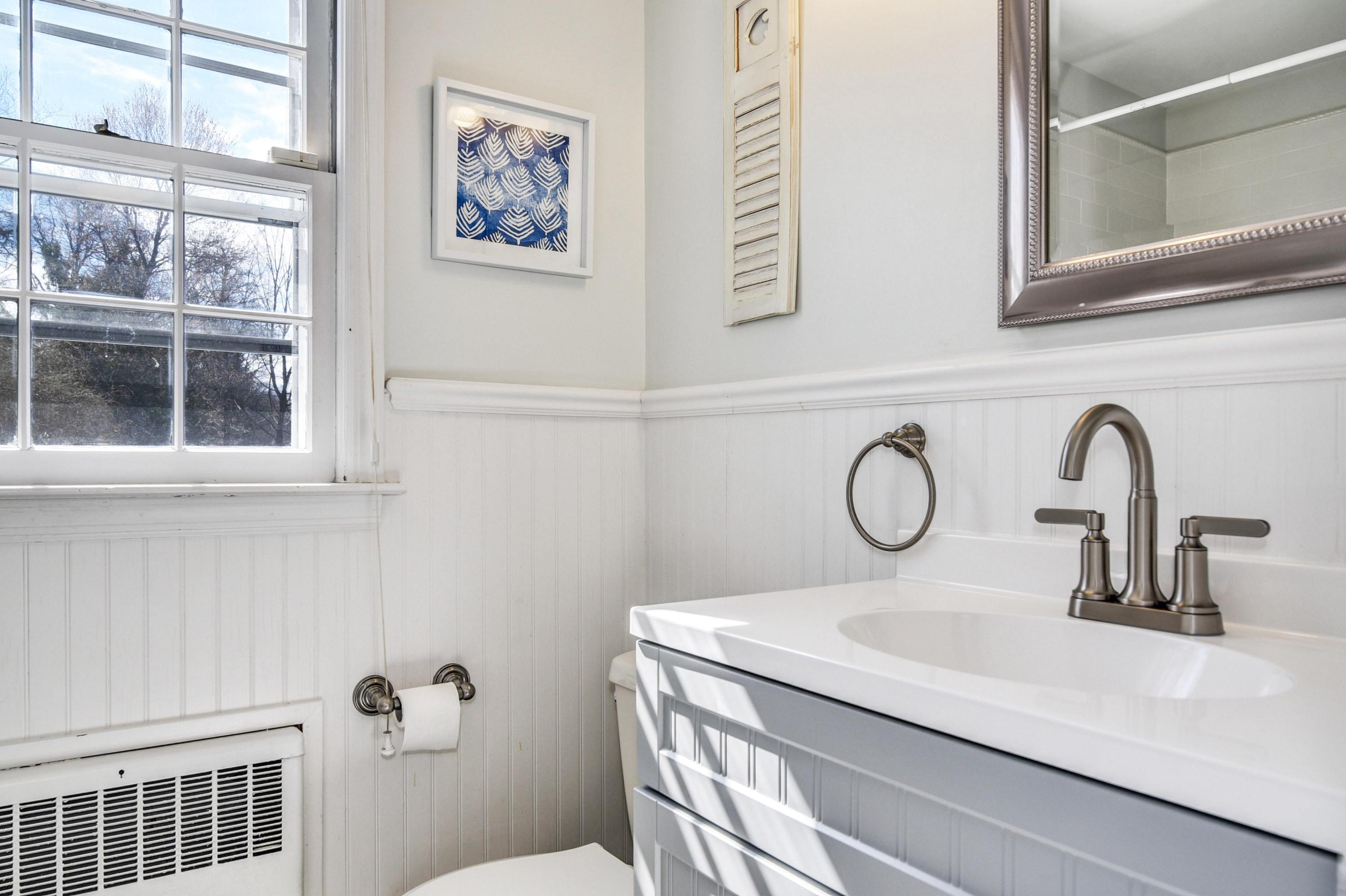 28 Briar Brae Road Darien, CT 06820 - Photo 23 of 33 a bathroom with a sink and a toilet
