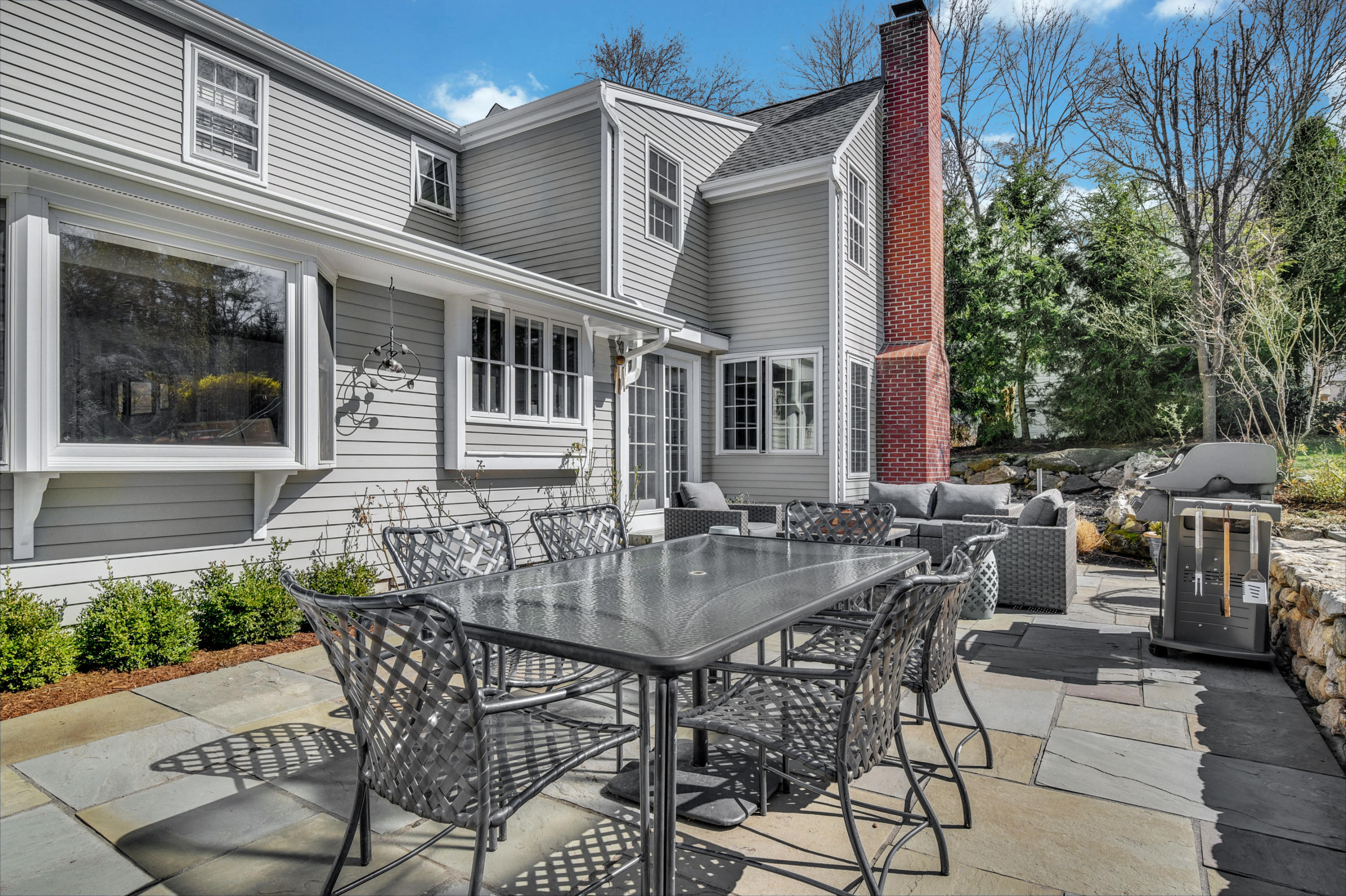 28 Briar Brae Road Darien, CT 06820 - Photo 28 of 33 a view of house with backyard and sitting area
