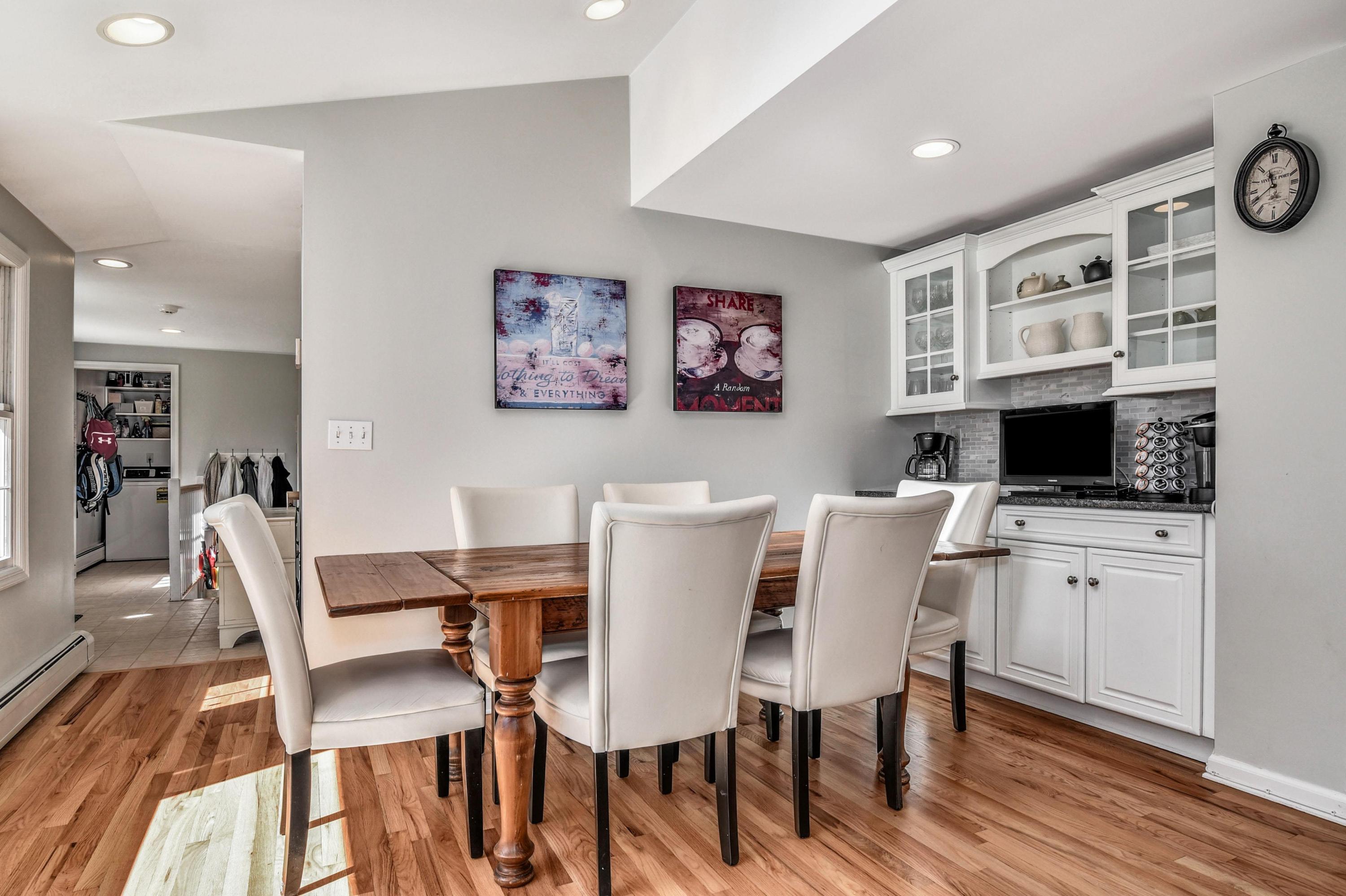 28 Briar Brae Road Darien, CT 06820 - Photo 5 of 33 a view of a dining room with furniture and wooden floor