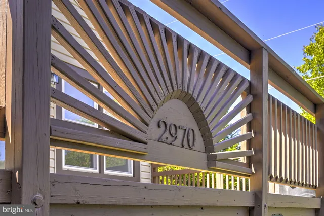 a view of a street with an outdoor seating