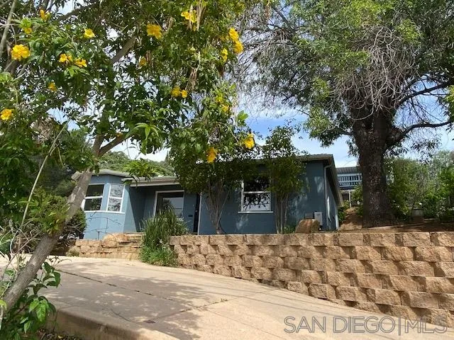 9243 Westhill Road Lakeside, CA 92040 - Photo 2 of 26 front view of a house with a tree