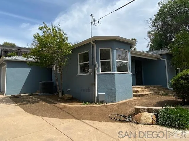 9243 Westhill Road Lakeside, CA 92040 - Photo 3 of 26 a front view of a house with a yard