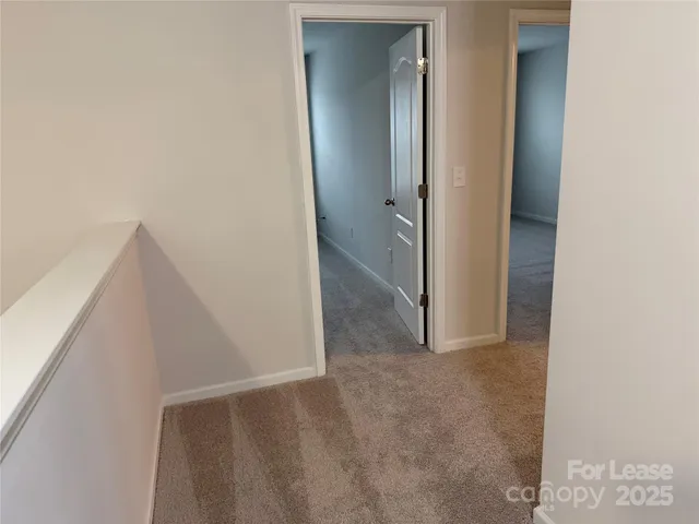a bathroom with a granite countertop sink a mirror and a shower