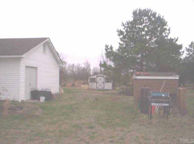752 Clayhole Road Dunn, NC 28334 - Photo 3 of 4 outside storage building