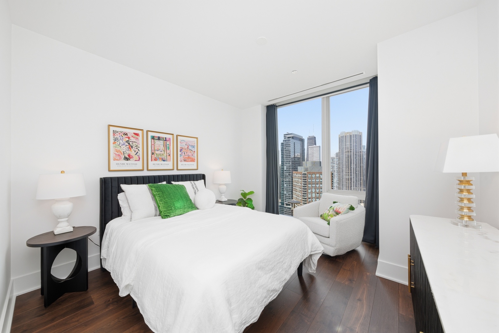363 East Wacker Drive, Unit 2708 Chicago, IL 60601 - Photo 11 of 48 a bedroom with a bed and a large window