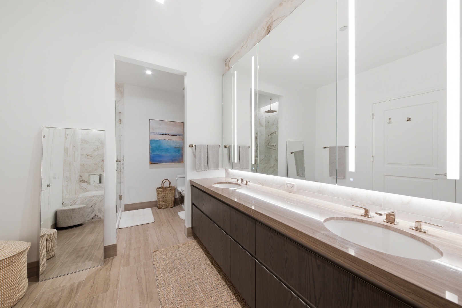 363 East Wacker Drive, Unit 2708 Chicago, IL 60601 - Photo 16 of 48 a en suite bathroom with a double vanity sink a mirror and a shower