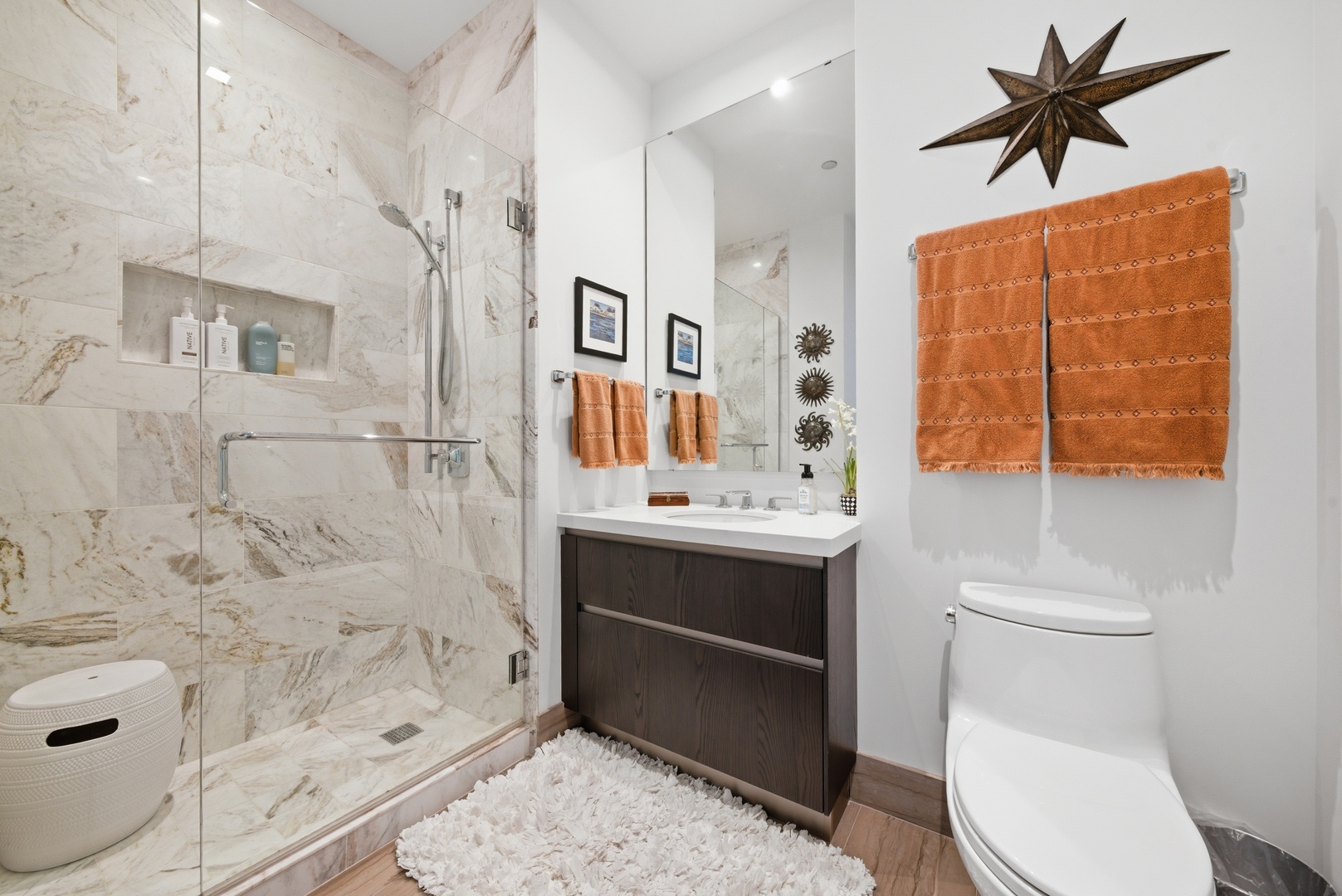 363 East Wacker Drive, Unit 2708 Chicago, IL 60601 - Photo 18 of 48 a bathroom with a sink toilet and shower