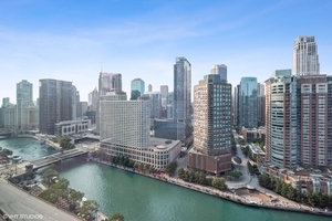 363 East Wacker Drive, Unit 2708 Chicago, IL 60601 - Photo 20 of 48 a view of a city with tall buildings