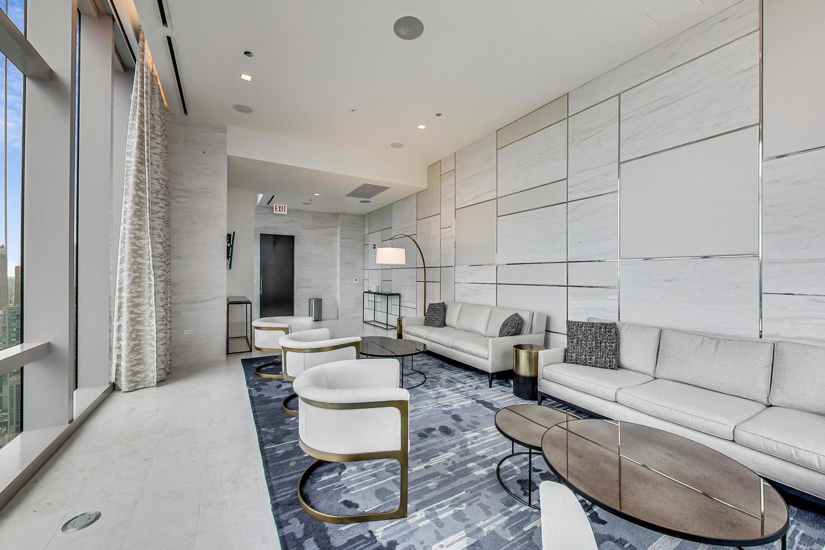 363 East Wacker Drive, Unit 2708 Chicago, IL 60601 - Photo 26 of 48 a living room with furniture