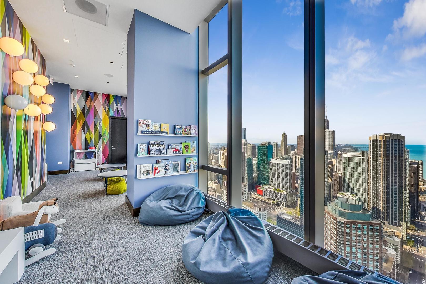 363 East Wacker Drive, Unit 2708 Chicago, IL 60601 - Photo 36 of 48 a room with lots of stuff and couch